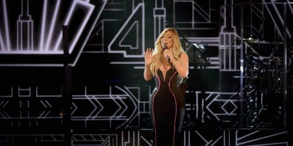 Mariah Carey in lit wings on her Christmas tour, photo 3