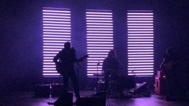 LOW on stage in front of LED towers, photo 3
