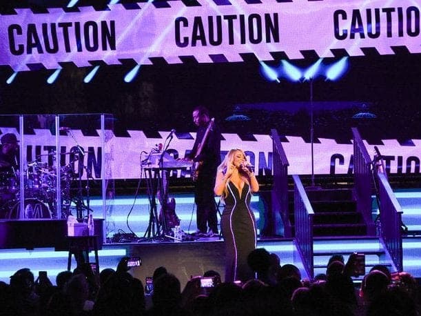 Mariah Carey in lit wings on her Christmas tour, photo 4