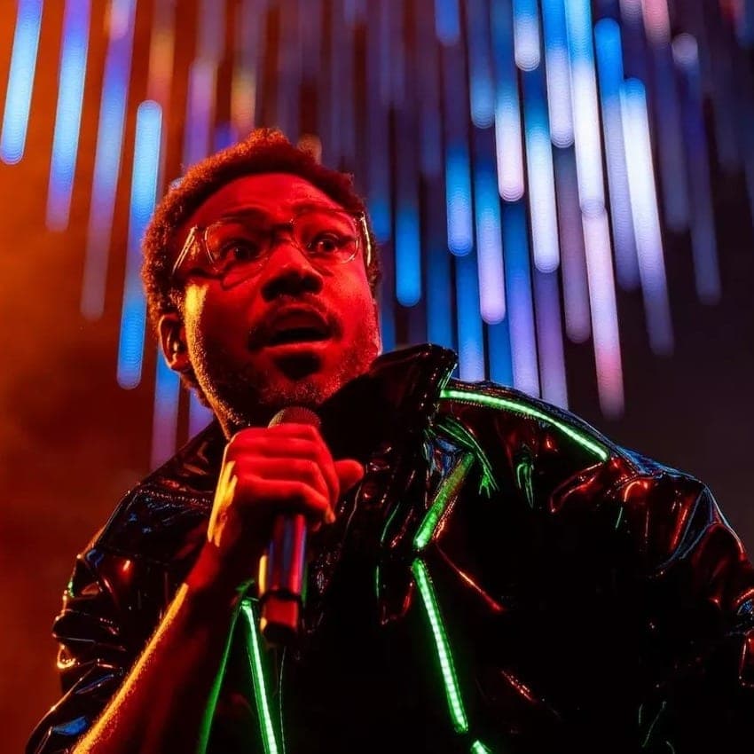 Childish Gambino on stage in a light-up jacket on The New World Tour, photo 2